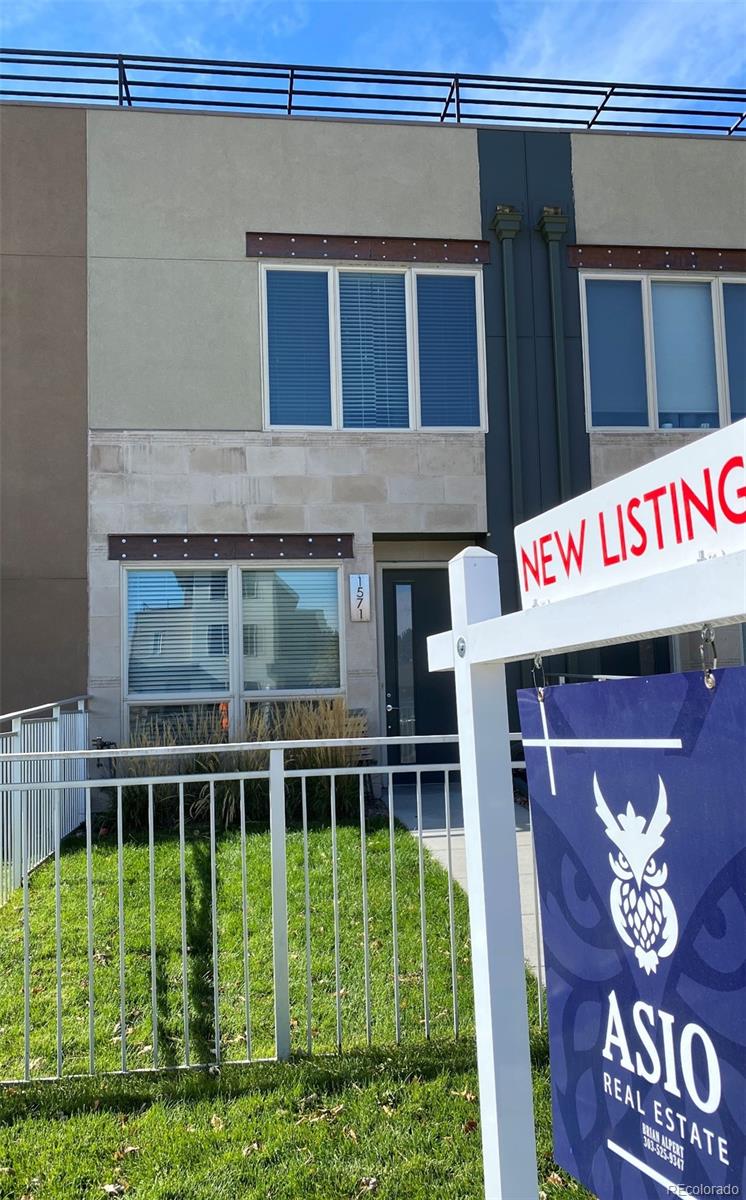 a sign that is on a brick building