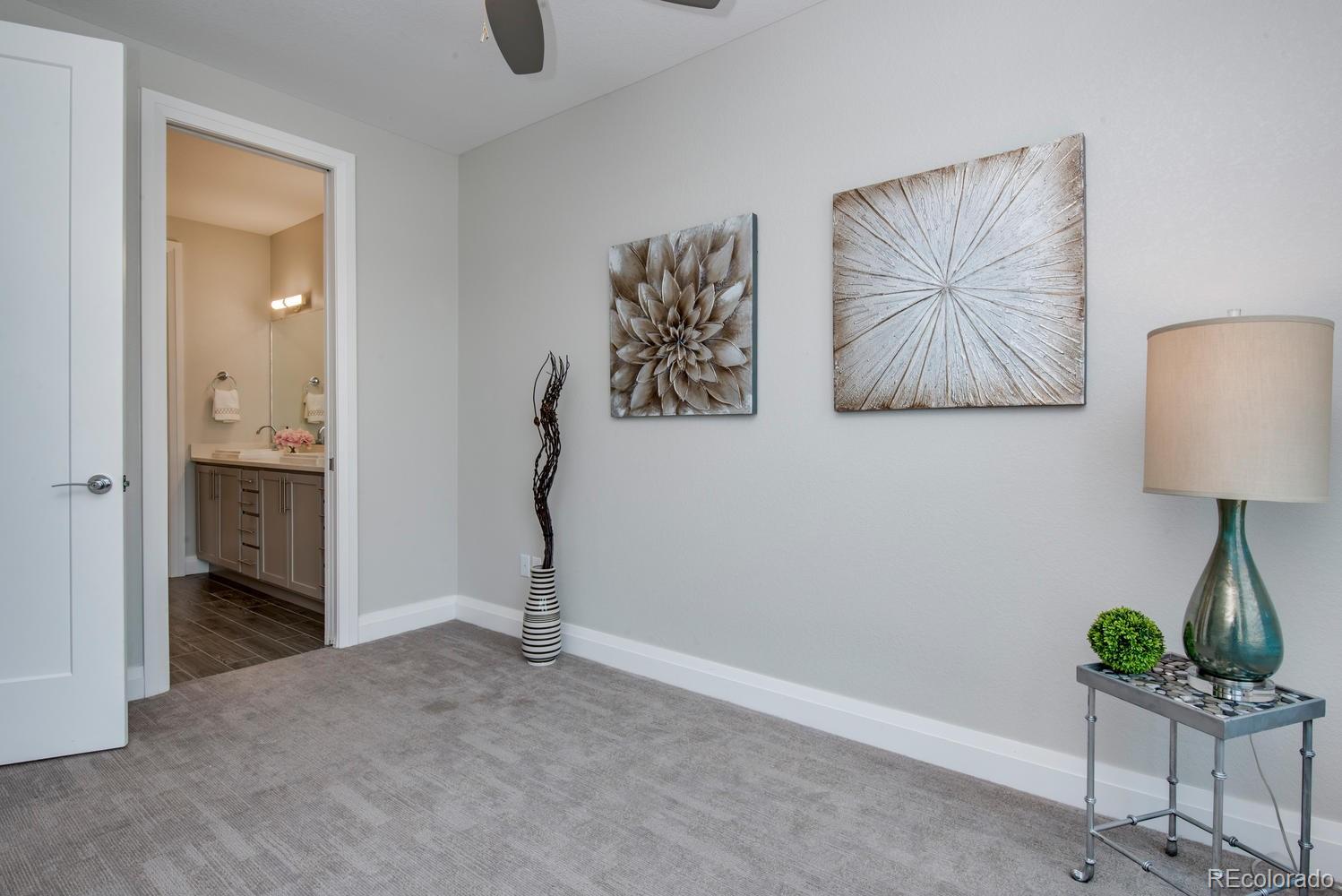 1571 Wolff Street Denver, CO 80204 - Photo 15 of 27 a view of room with window and wooden floor