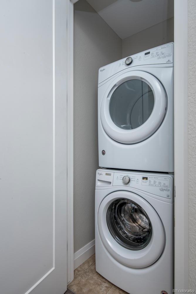 1571 Wolff Street Denver, CO 80204 - Photo 25 of 27 a utility room with dryer and washer