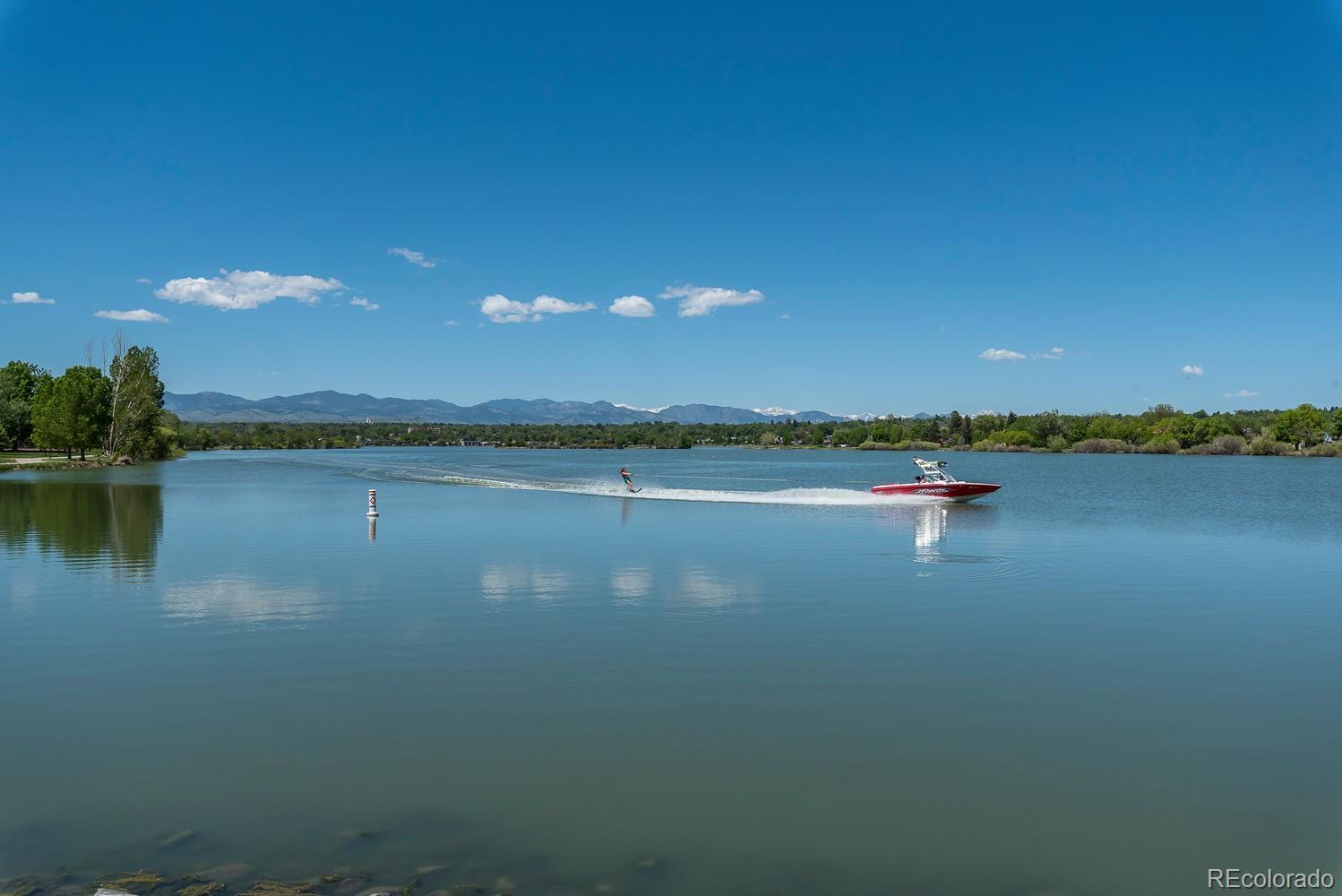1571 Wolff Street Denver, CO 80204 - Photo 27 of 27 a view of a lake with houses in the background