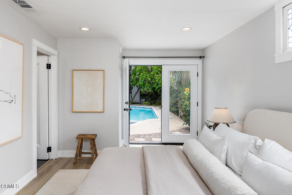 2040 North Madison Avenue Altadena, CA 91001 - Photo 19 of 35 a living room with furniture and a large window