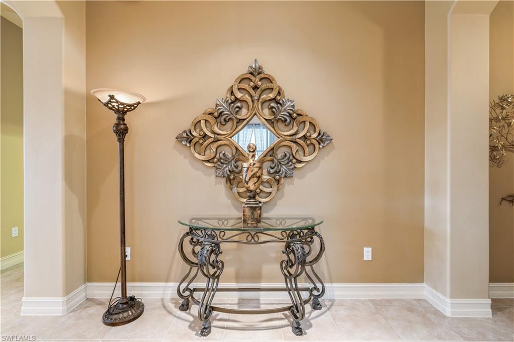 1411 Serrano Circle Naples, FL 34105 - Photo 11 of 50 Room details featuring tile patterned floors