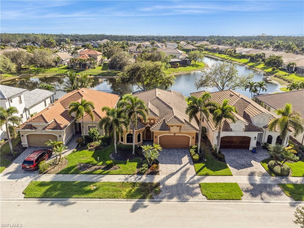 1411 Serrano Circle Naples, FL 34105 - Photo 47 of 50 Birds eye view of property featuring a water view