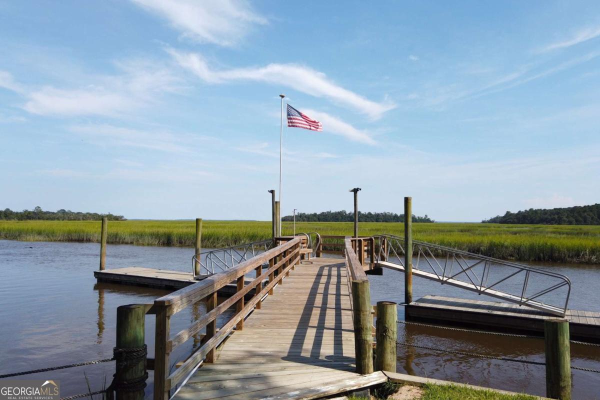2061 Belle Island Road Richmond Hill, GA 31324 - Photo 40 of 49 a view of a lake with a outdoor space