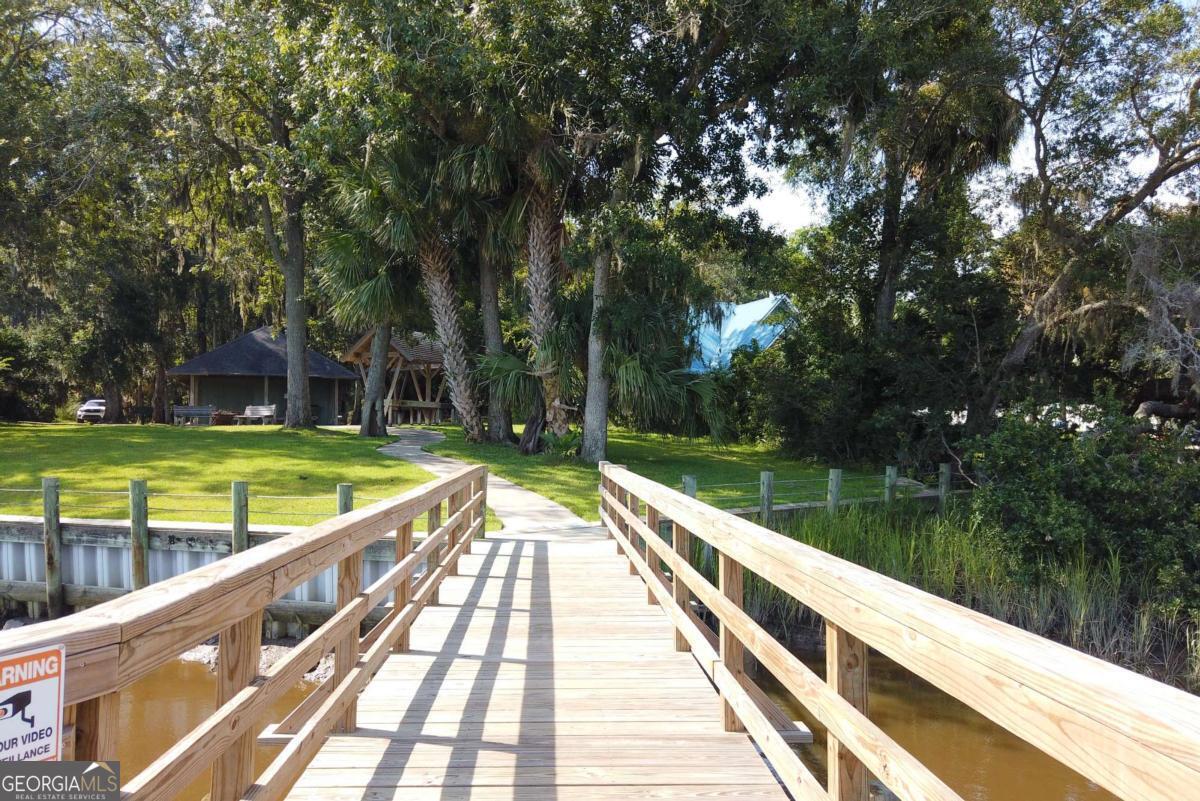 2061 Belle Island Road Richmond Hill, GA 31324 - Photo 42 of 49 a view of swimming pool with a yard