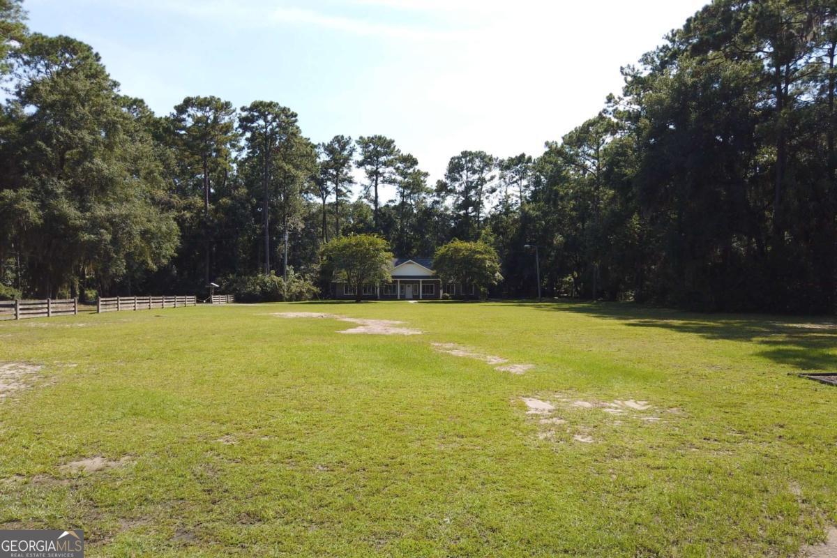 2061 Belle Island Road Richmond Hill, GA 31324 - Photo 48 of 49 a view of an outdoor space and swimming pool