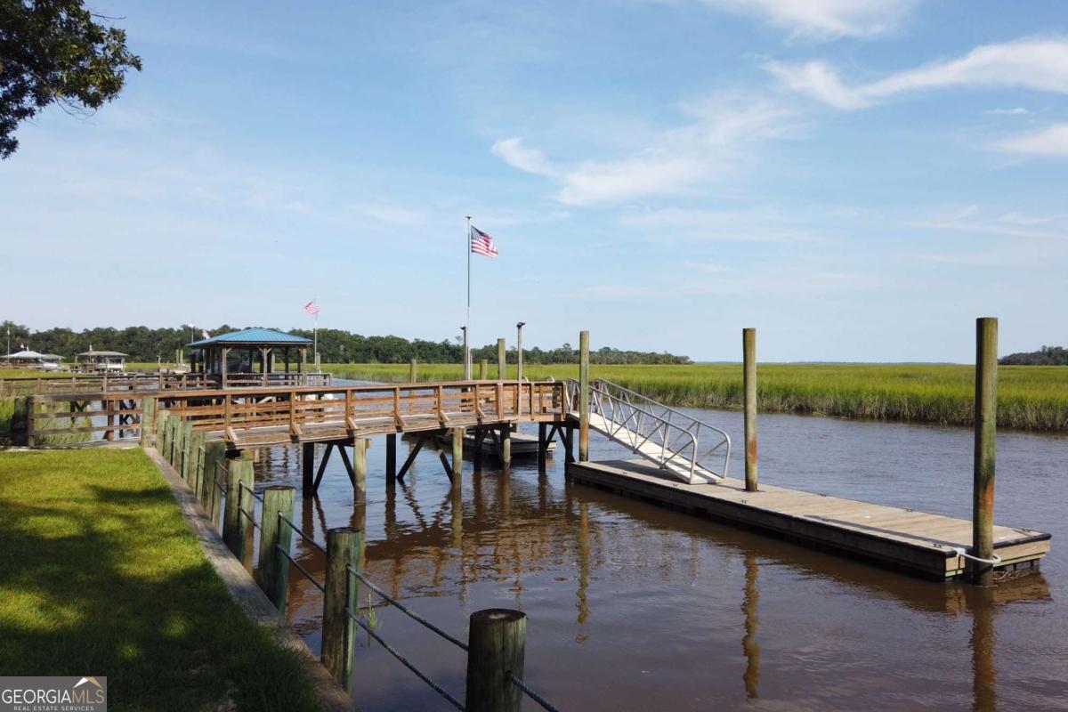 2061 Belle Island Road Richmond Hill, GA 31324 - Photo 49 of 49 a view of swimming pool with outdoor seating