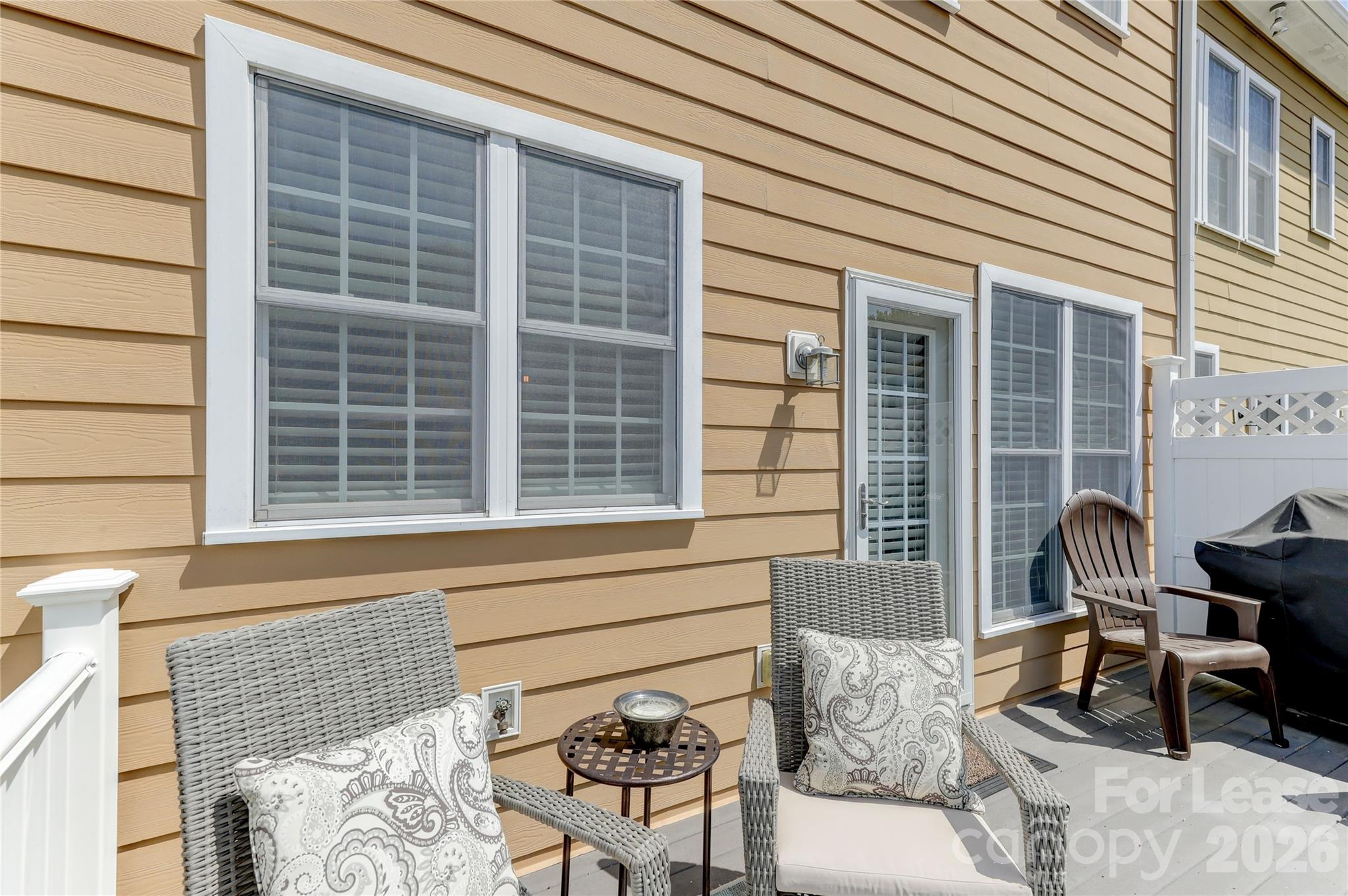 905 Lyndley Drive Fort Mill, SC 29708 - Photo 20 of 42 a front view of a house with outdoor seating