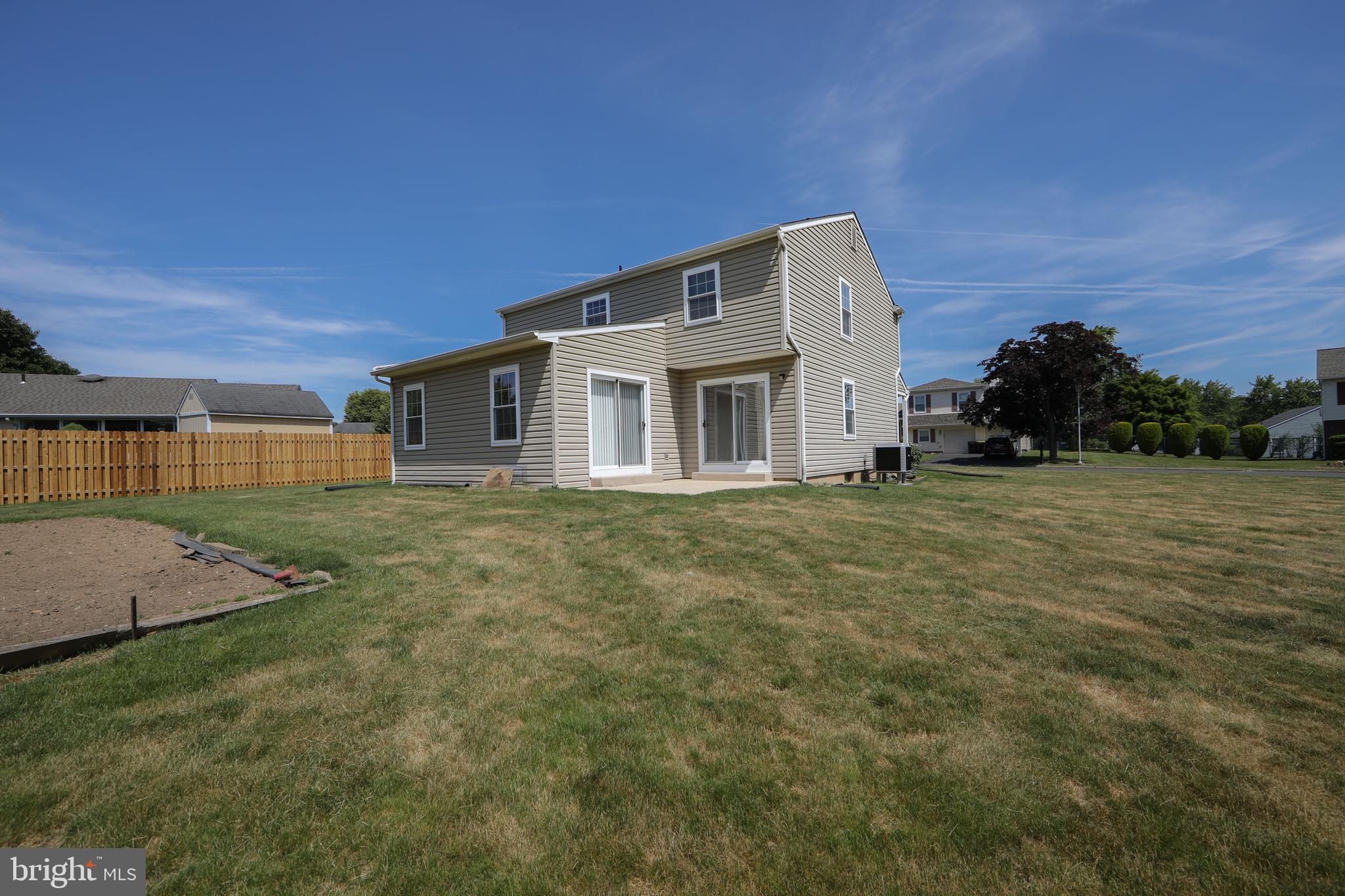 3007 Rampart Road Bensalem, PA 19020 - Photo 44 of 48 a front view of a house with a yard