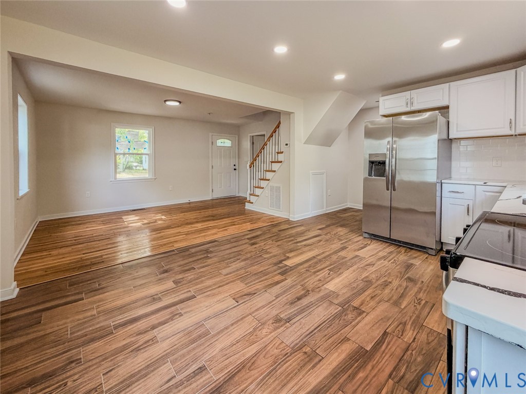 3409 Meadowbridge Road Richmond, VA 23222 - Photo 12 of 32 a view of empty room with wooden floor