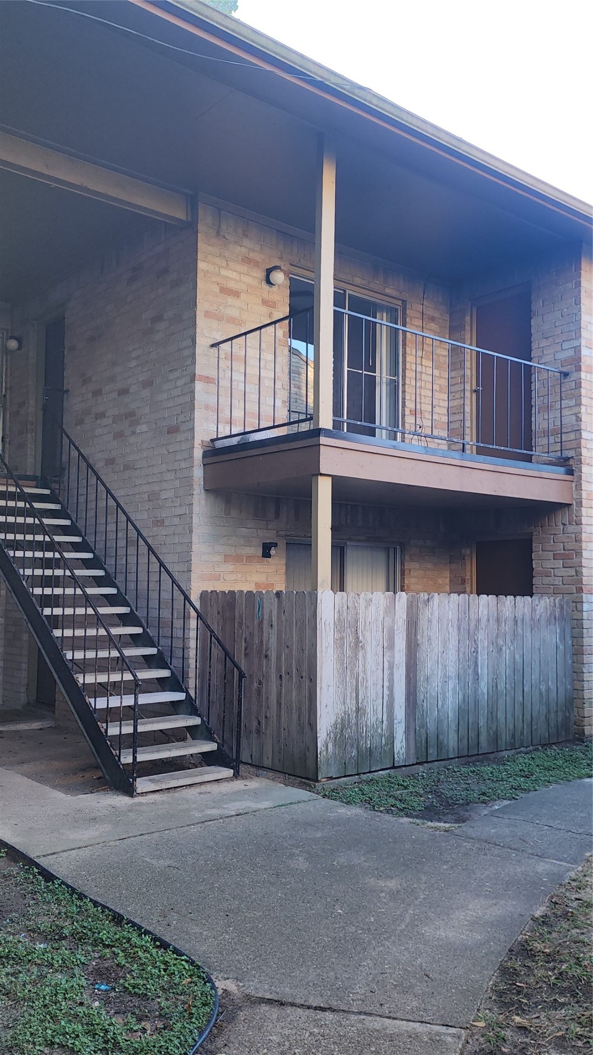 16303 Lyons School Road, Unit 701 Spring, TX 77379 - Photo 1 of 9 a view of a house with wooden fence