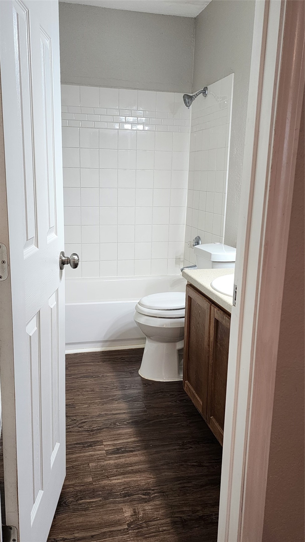 16303 Lyons School Road, Unit 701 Spring, TX 77379 - Photo 6 of 9 a bathroom with a sink a toilet and shower