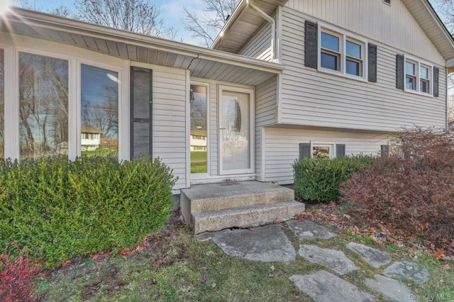 a kitchen with a stove a sink and a refrigerator
