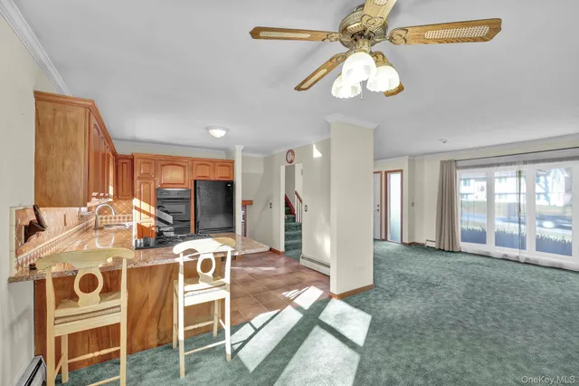 a big room with closet and windows