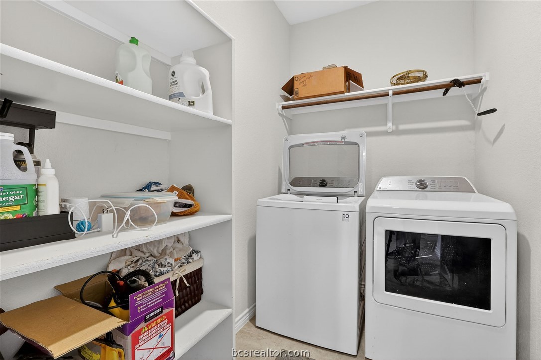 5235 Montague Loop Bryan, TX 77807 - Photo 20 of 25 a utility room with dryer and washer