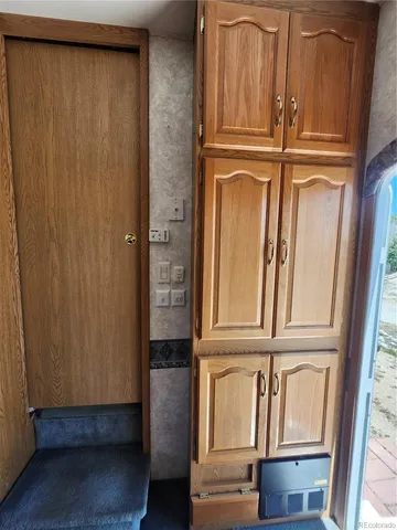 a bed room with a bed and a large window