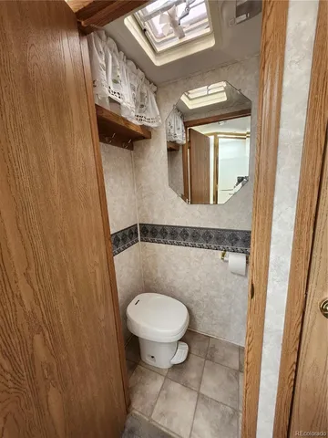 a bathroom with a sink a mirror and a bathtub