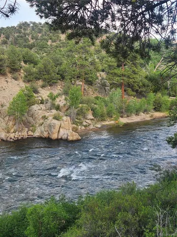 a view of a lake with mountains in the background