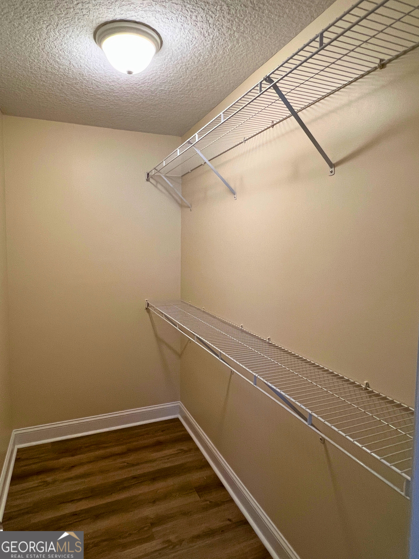 818 Davis Avenue Kingsland, GA 31548 - Photo 22 of 29 a view of a room with racks on the wall