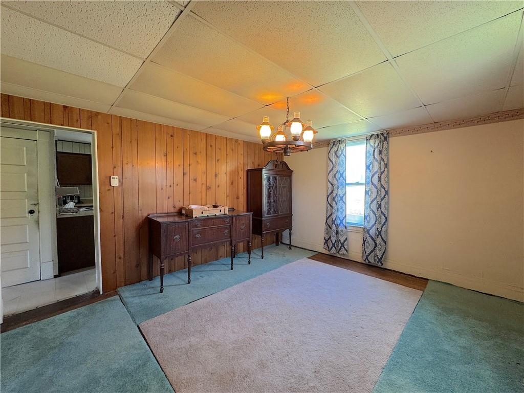 3003 Riverside Drive Claridge, PA 15623 - Photo 16 of 28 an empty room with chandelier fan and windows