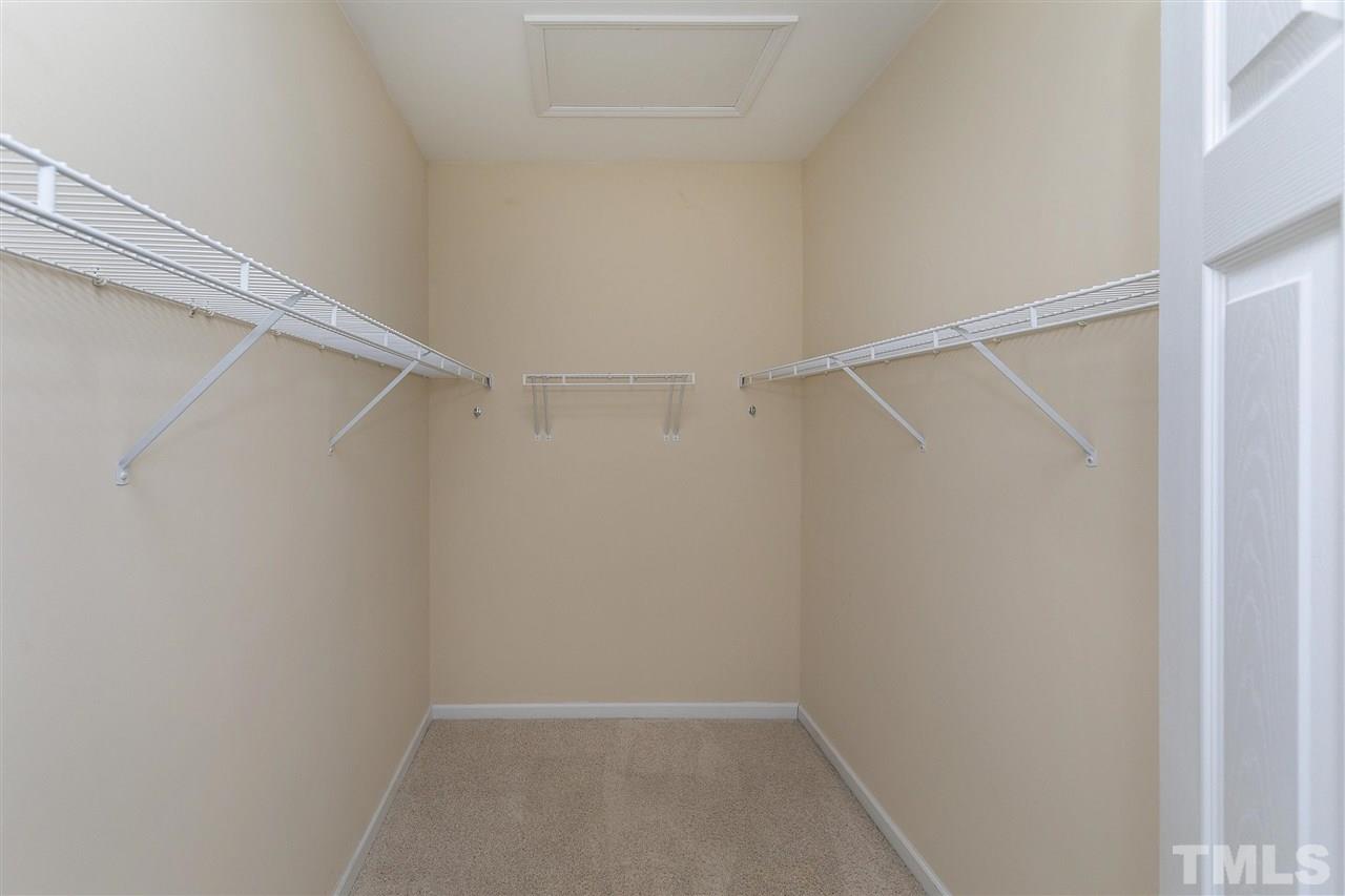 8424 Aztec Dawn Court Raleigh, NC 27613 - Photo 13 of 30 a view of an empty walk in closet