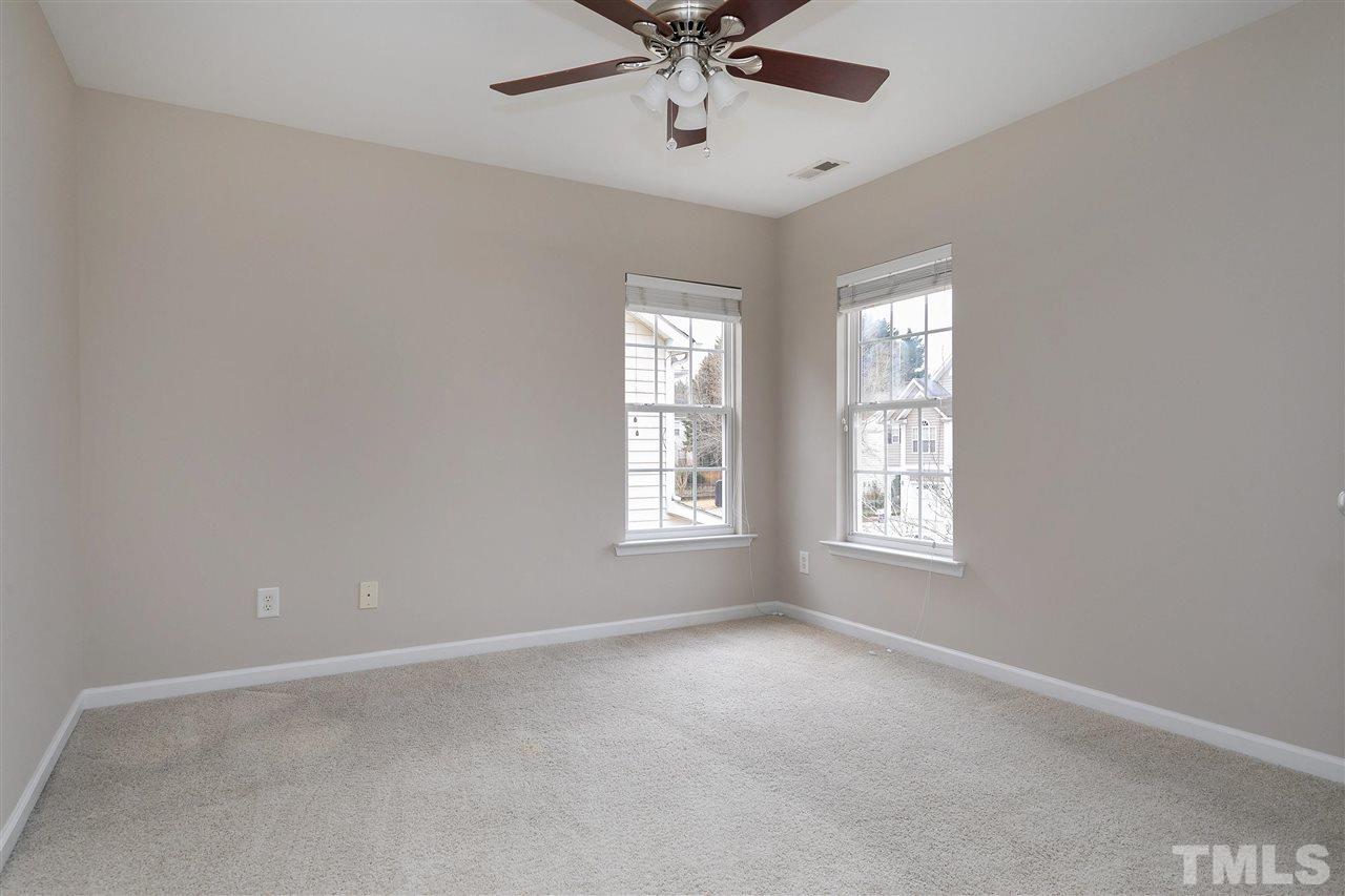 8424 Aztec Dawn Court Raleigh, NC 27613 - Photo 22 of 30 a view of an empty room with a window