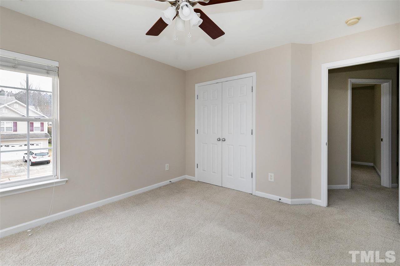 8424 Aztec Dawn Court Raleigh, NC 27613 - Photo 23 of 30 a view of an empty room with a window