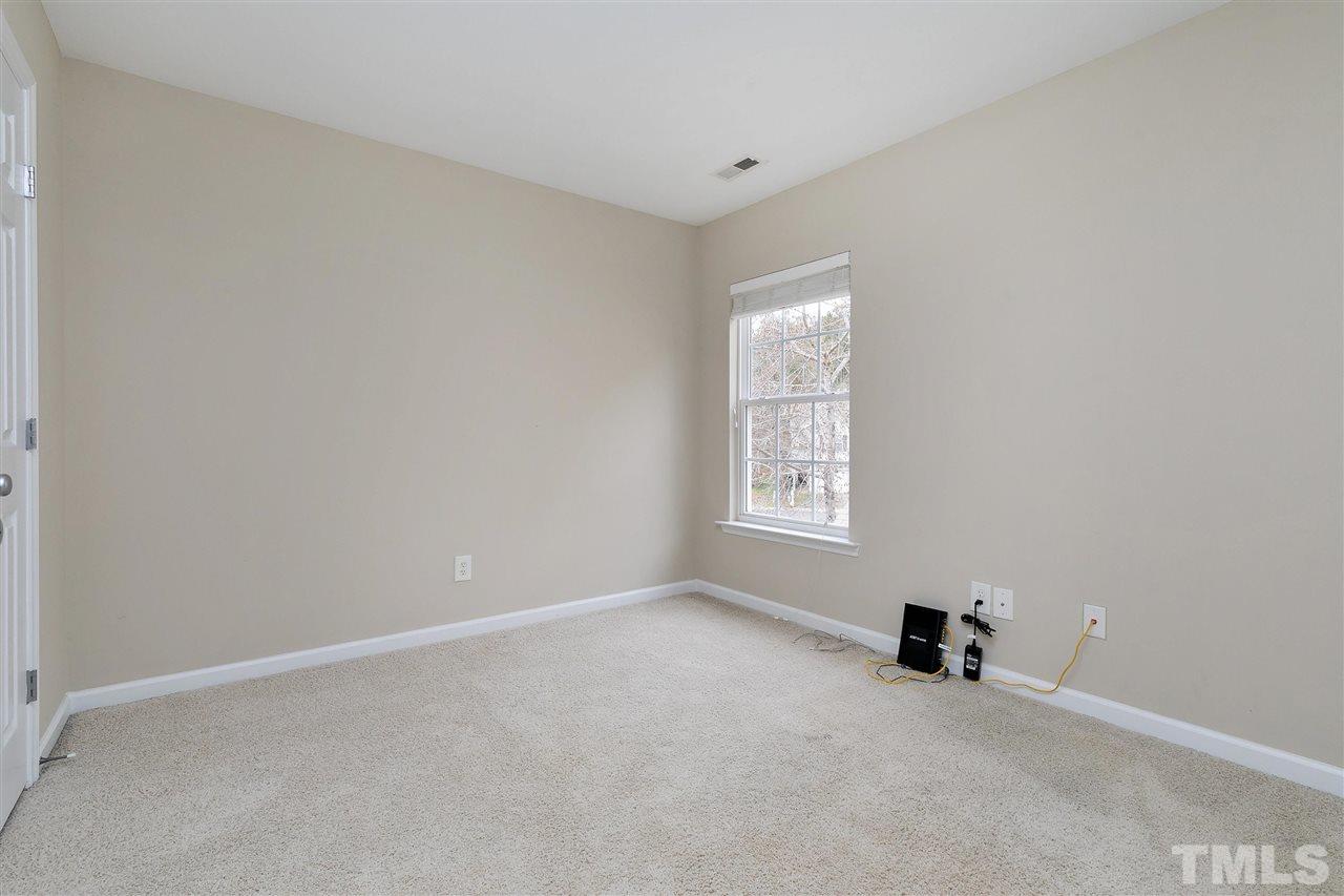 8424 Aztec Dawn Court Raleigh, NC 27613 - Photo 24 of 30 an empty room with a window