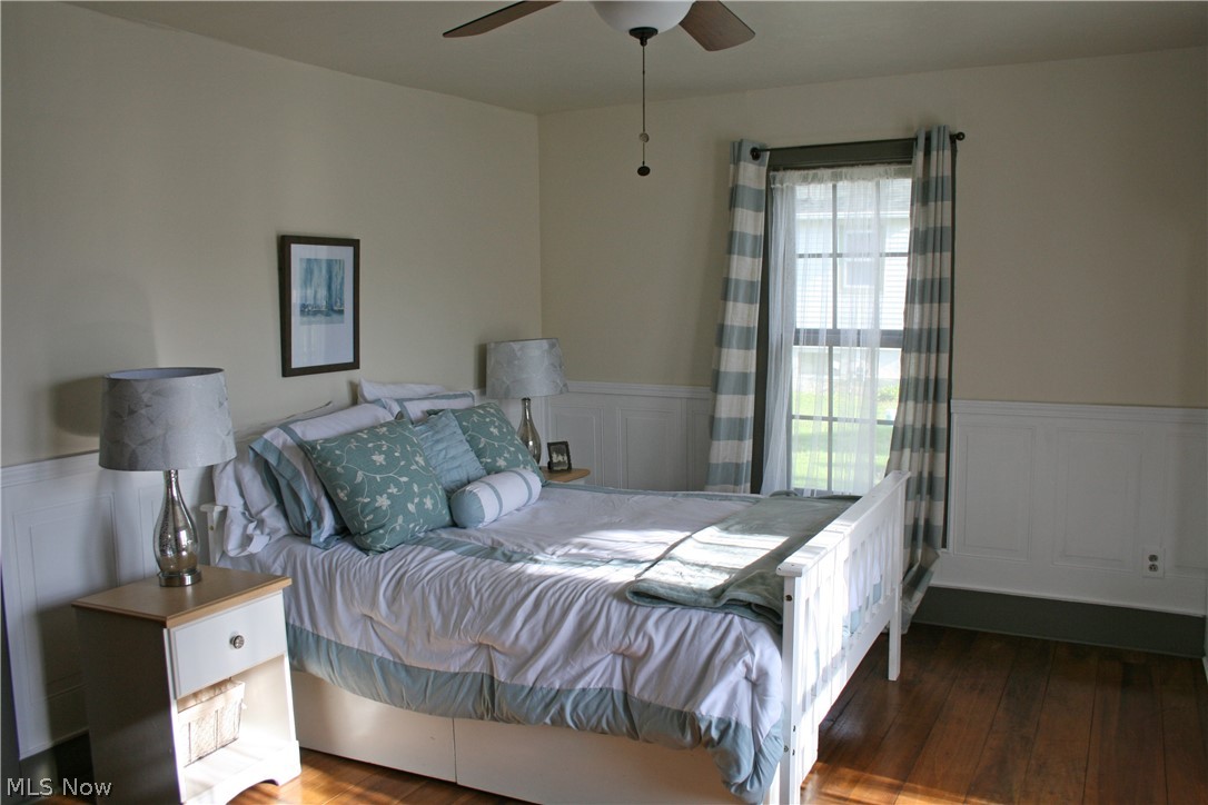 7915 Avon Belden Road North Ridgeville, OH 44039 - Photo 23 of 35 1st floor bedroom, newer light/ceiling fan and new flooring.