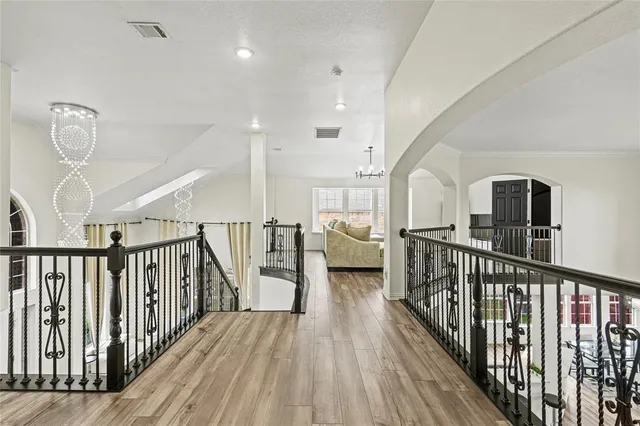a view of entryway with wooden floor