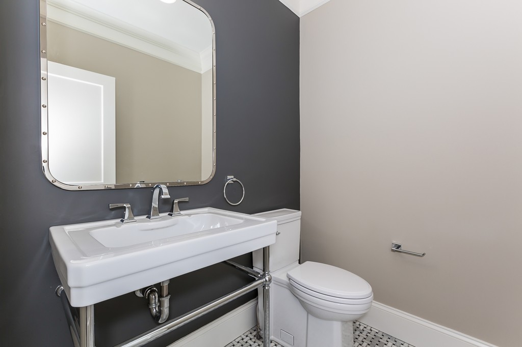14 Jackson Road Wellesley, MA 02481 - Photo 12 of 28 a bathroom with a sink toilet and a mirror