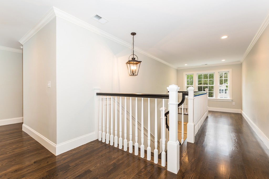 14 Jackson Road Wellesley, MA 02481 - Photo 13 of 28 a view of a hallway with wooden floor and windows