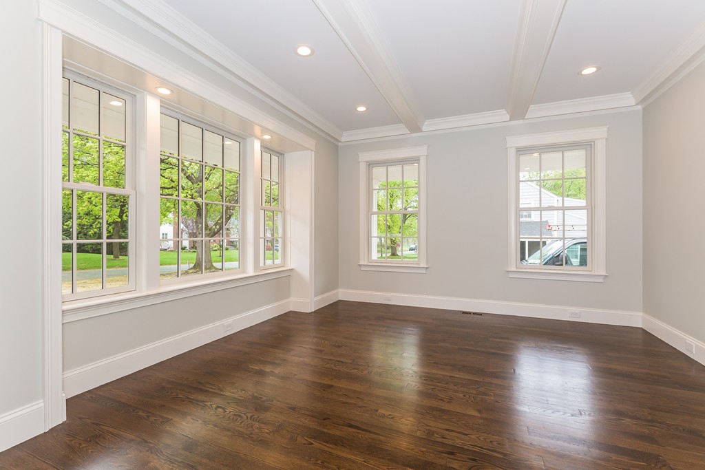 14 Jackson Road Wellesley, MA 02481 - Photo 3 of 28 a view of an empty room with wooden floor and a window