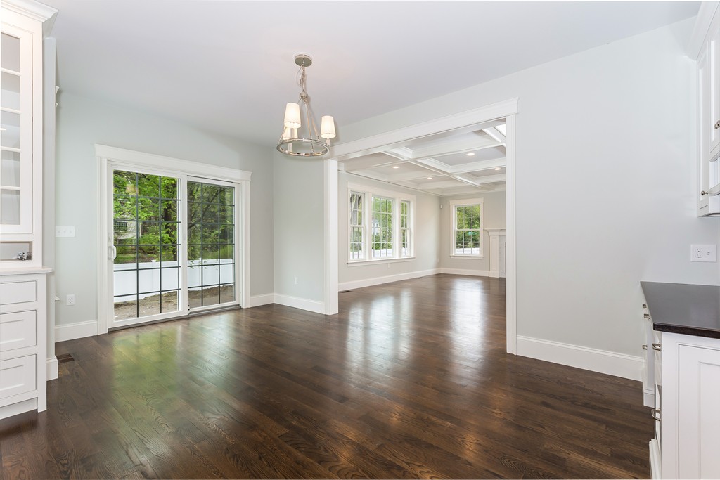 14 Jackson Road Wellesley, MA 02481 - Photo 5 of 28 a view of empty room with wooden floor and large window