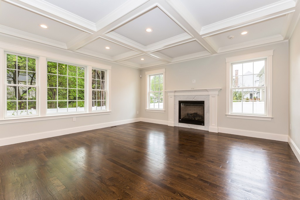 14 Jackson Road Wellesley, MA 02481 - Photo 10 of 28 an empty room with wooden floor and windows
