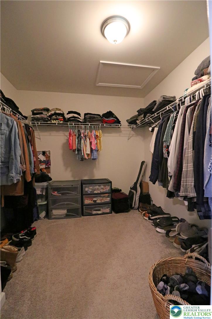 4502 Benjamin Court Emmaus, PA 18049 - Photo 31 of 53 Ample hanging and shelf storage define this functional walk-in closet space.