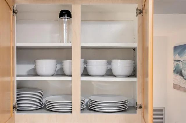 a workspace with furniture and window