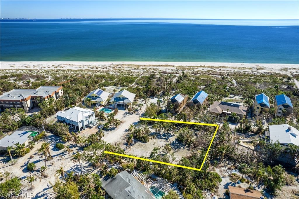 1119 Seagrape Lane Sanibel, FL 33957 - Photo 6 of 13 a view of a city