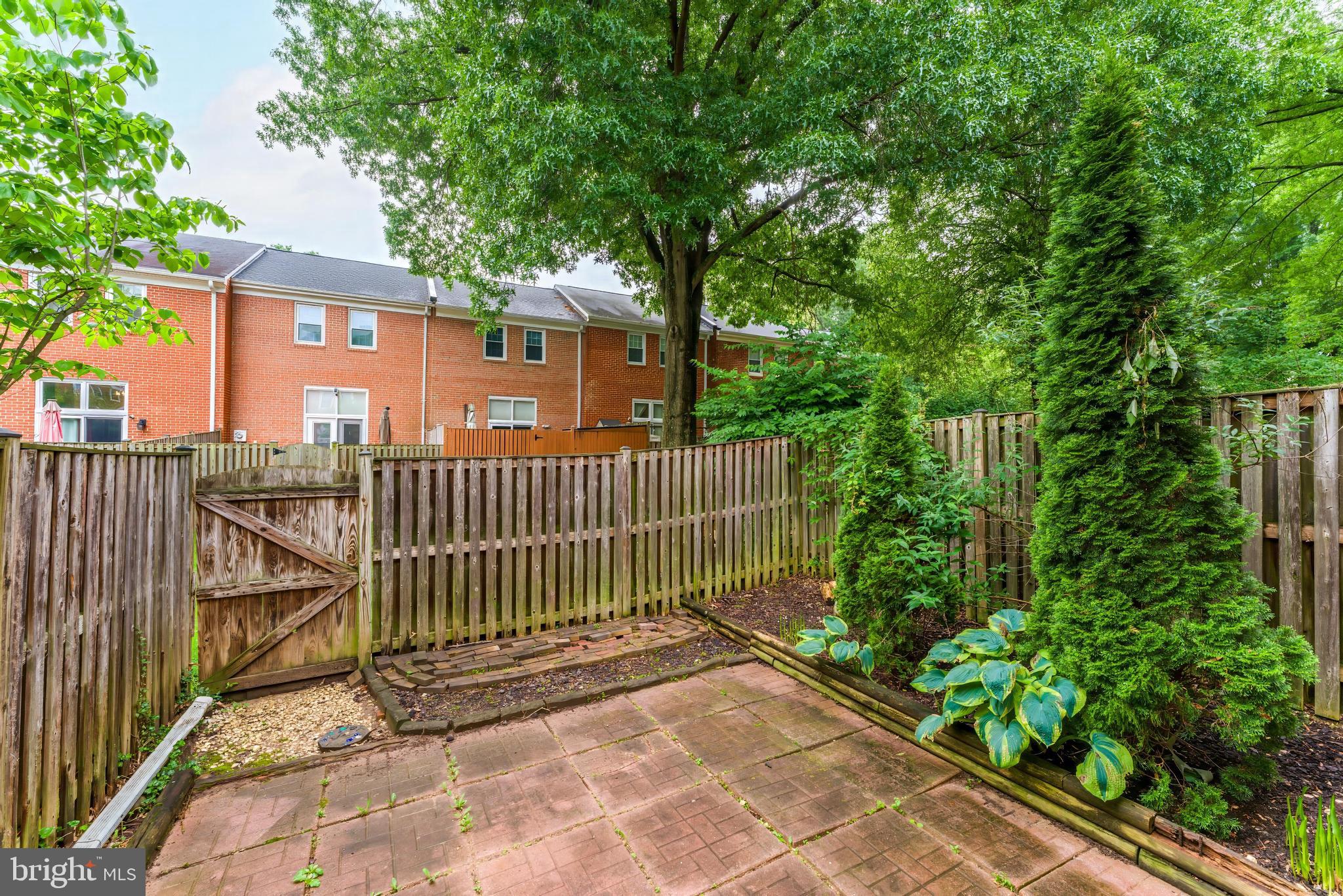 2331 Harleyford Court Reston, VA 20191 - Photo 39 of 40 Serene garden retreat with lush greenery.