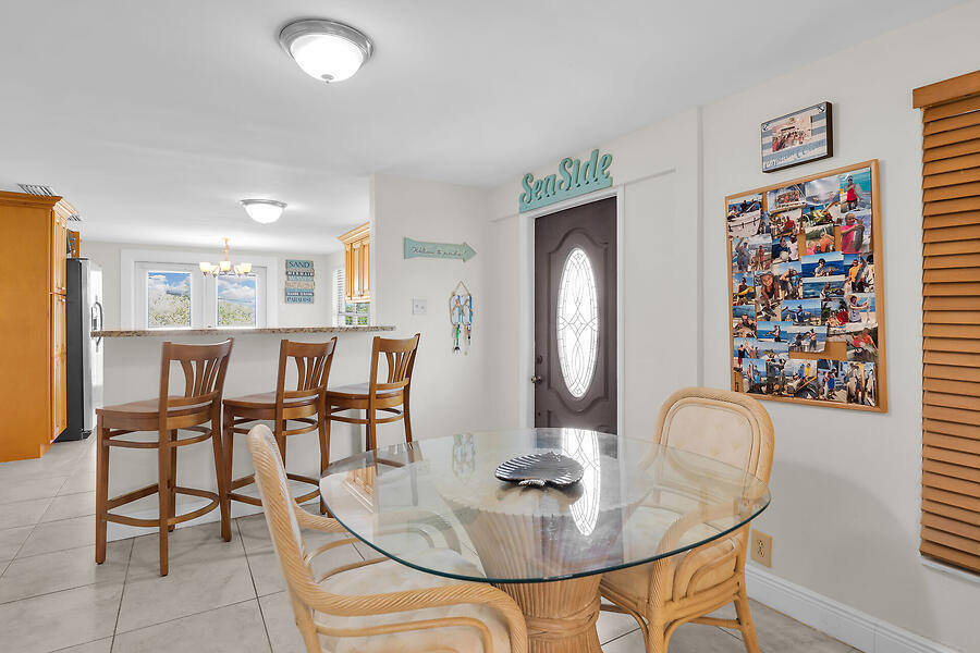 303 Sombrero Beach Road Marathon, FL 33050 - Photo 11 of 84 Side B-dining area w/bar seating