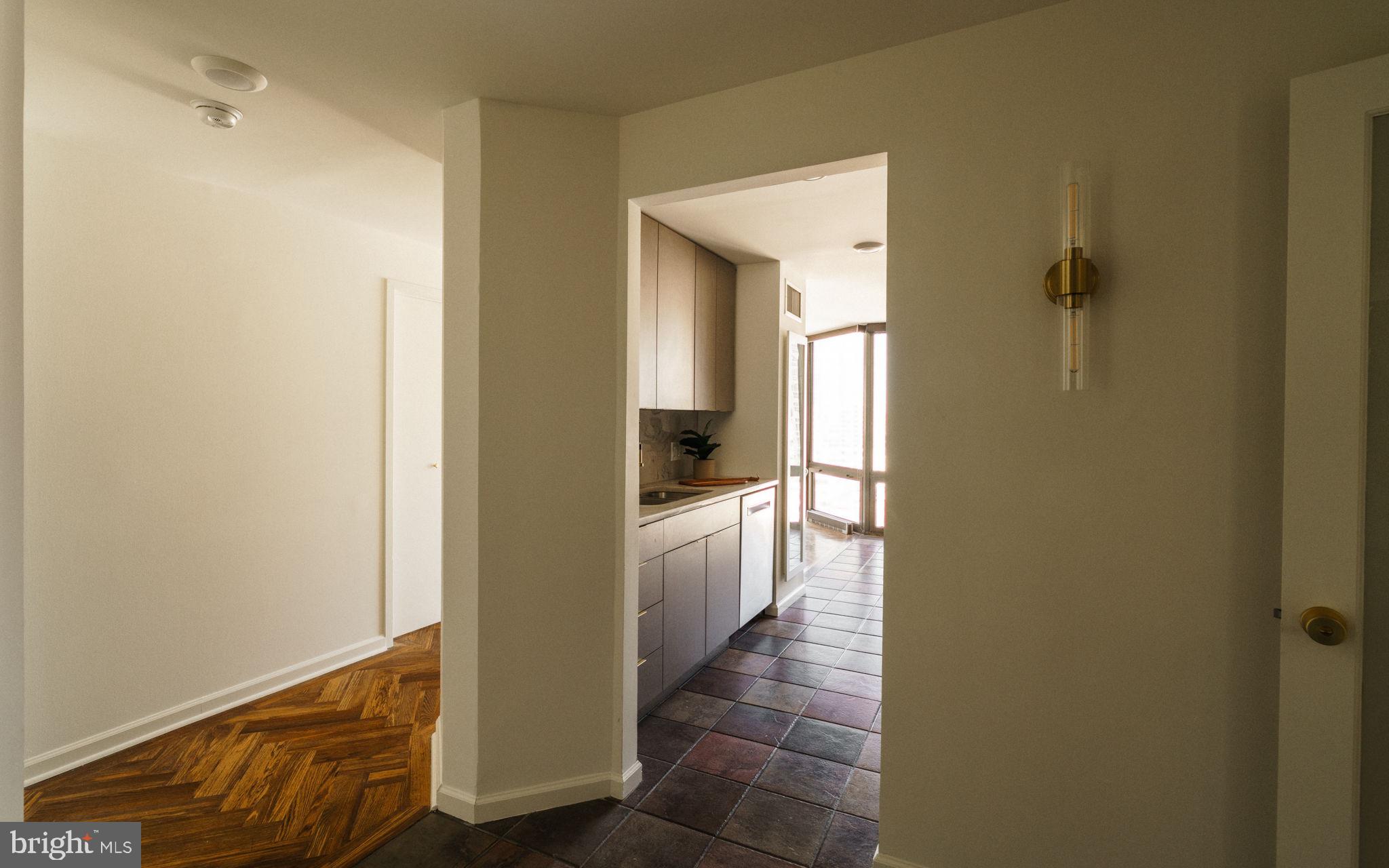 2018-32 Walnut Street, Unit 16GH Philadelphia, PA 19103 - Photo 13 of 78 a bathroom with a sink and mirror