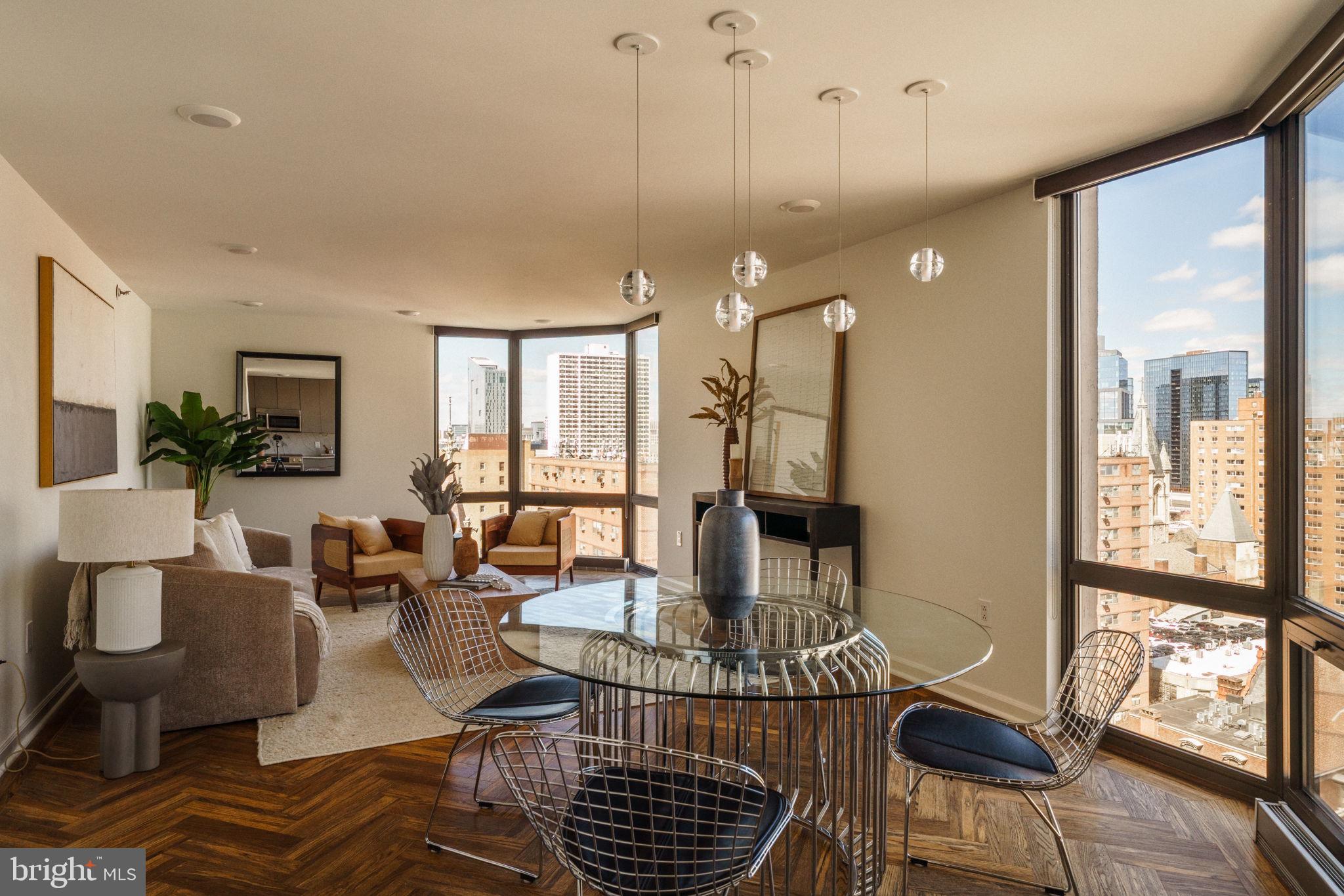 2018-32 Walnut Street, Unit 16GH Philadelphia, PA 19103 - Photo 24 of 78 a living room with fireplace furniture and a large window