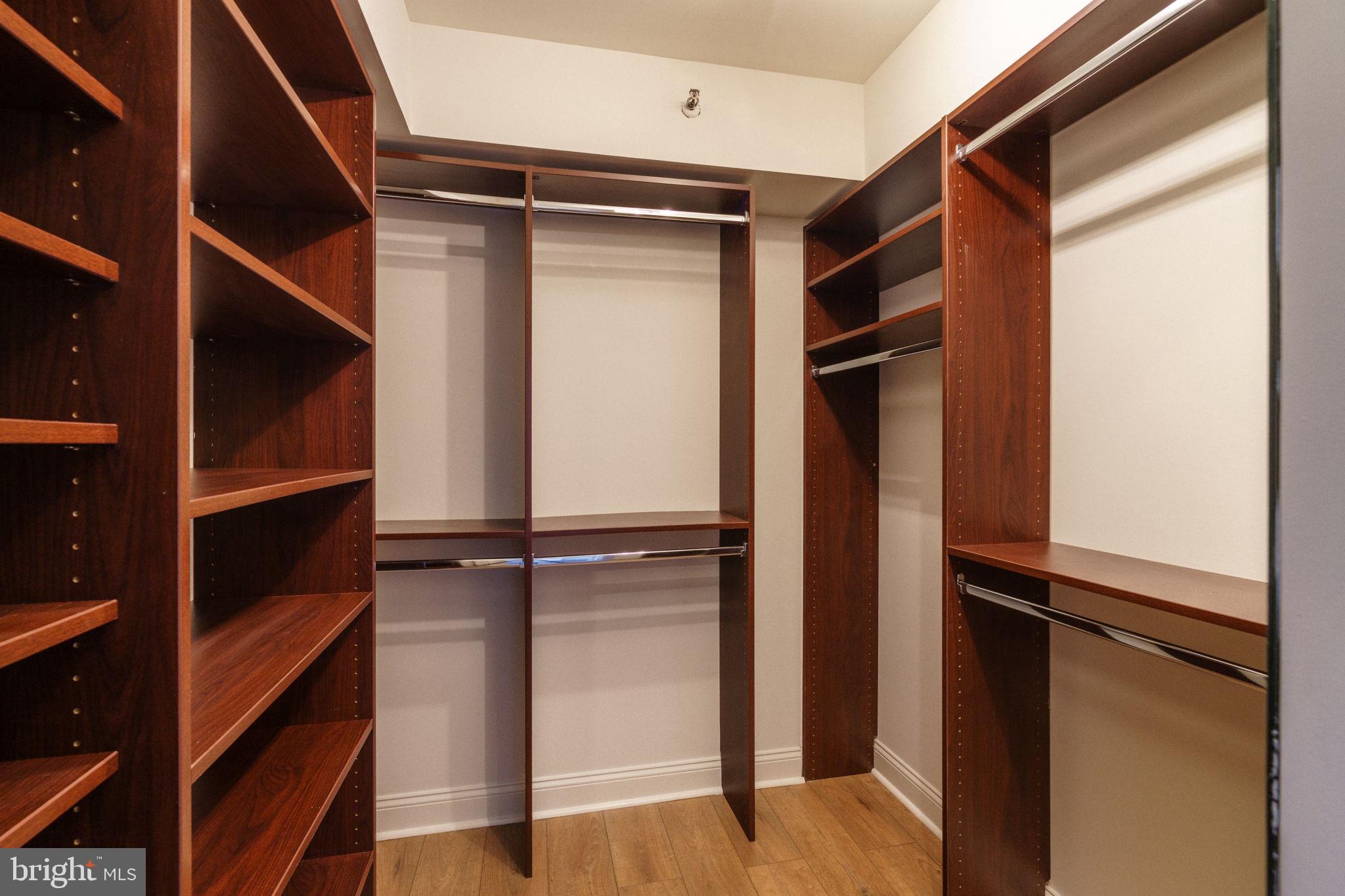 2018-32 Walnut Street, Unit 16GH Philadelphia, PA 19103 - Photo 35 of 78 a view of walk in closet with clothes and shoes