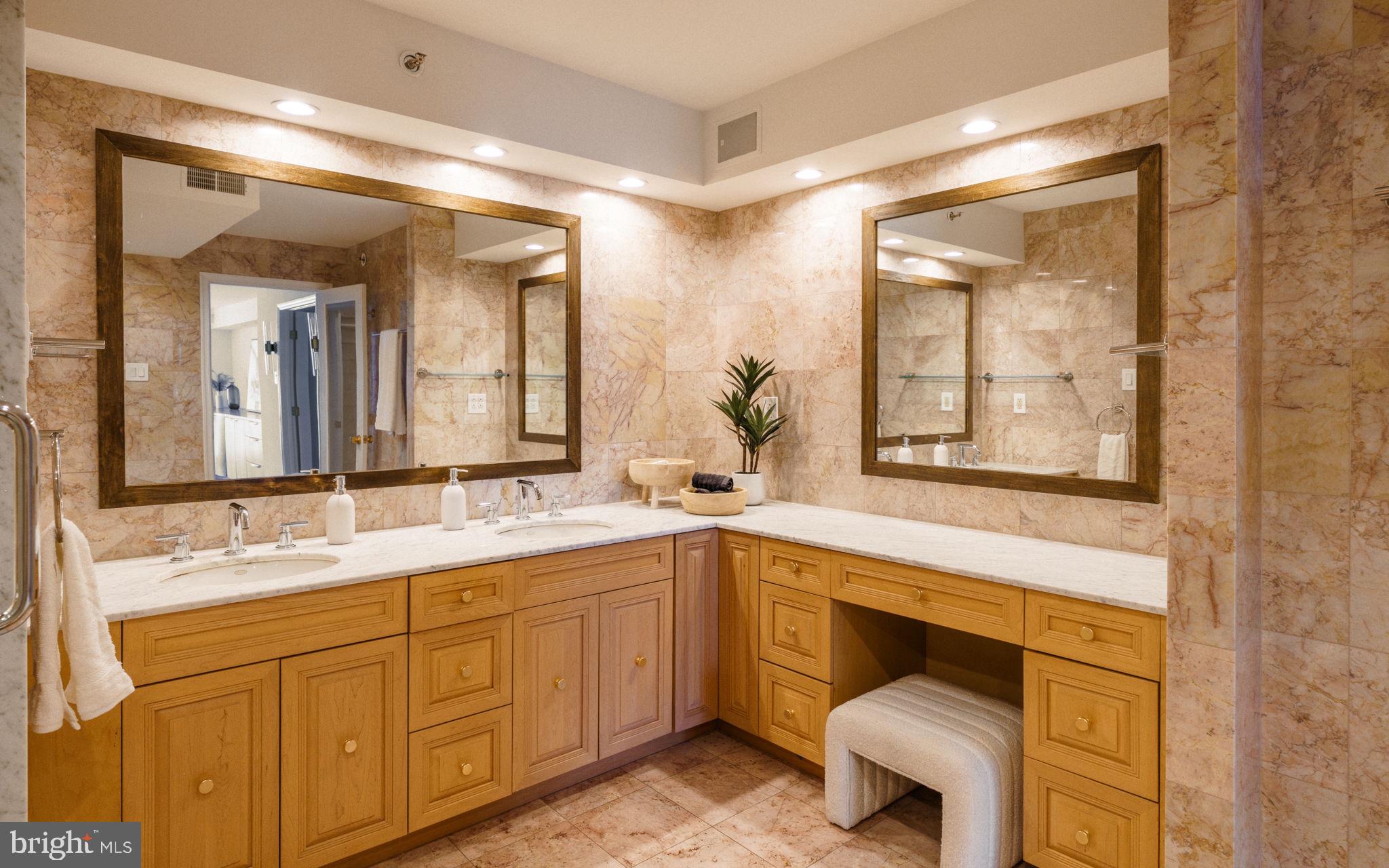 2018-32 Walnut Street, Unit 16GH Philadelphia, PA 19103 - Photo 38 of 78 a spacious bathroom with a granite countertop sink mirror and a