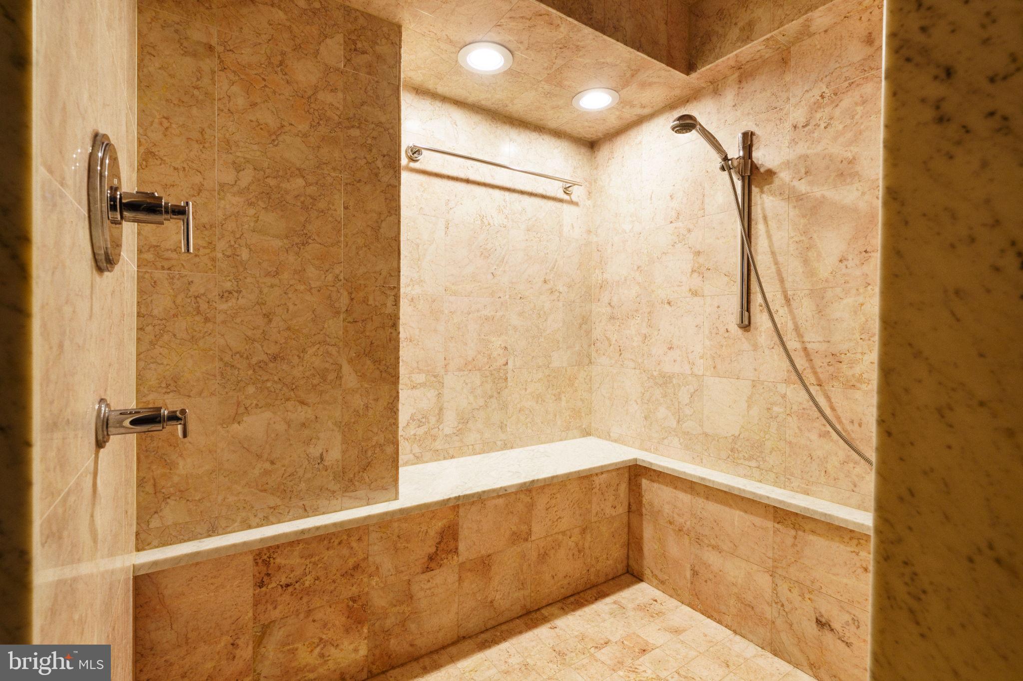 2018-32 Walnut Street, Unit 16GH Philadelphia, PA 19103 - Photo 40 of 78 a bathroom with a shower and a bathtub