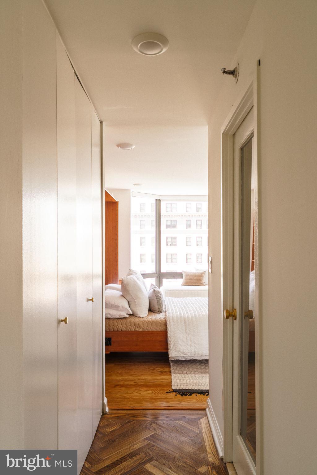 2018-32 Walnut Street, Unit 16GH Philadelphia, PA 19103 - Photo 44 of 78 a bedroom with a bed and a window