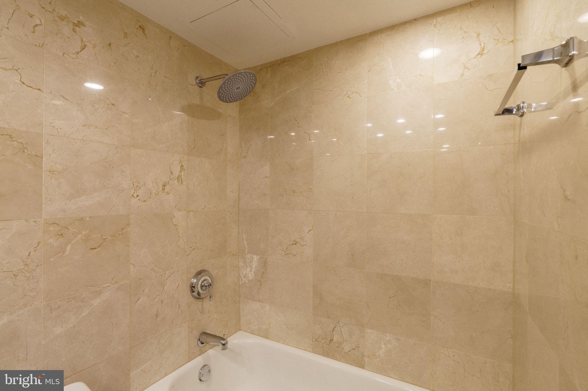 2018-32 Walnut Street, Unit 16GH Philadelphia, PA 19103 - Photo 51 of 78 a bathroom with a shower and a shower