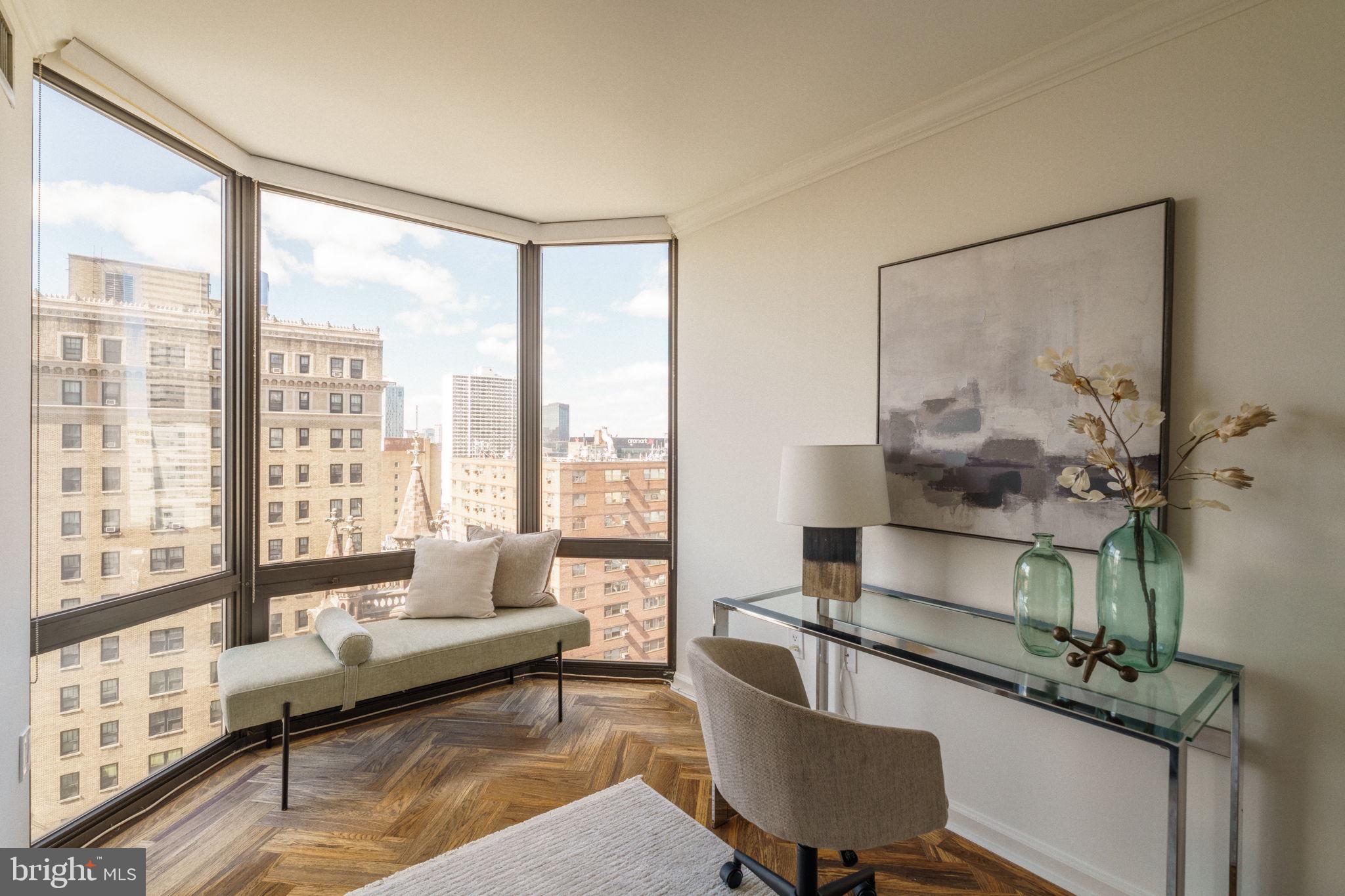 2018-32 Walnut Street, Unit 16GH Philadelphia, PA 19103 - Photo 54 of 78 a living room with furniture and a window