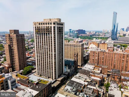 a view of city with tall buildings