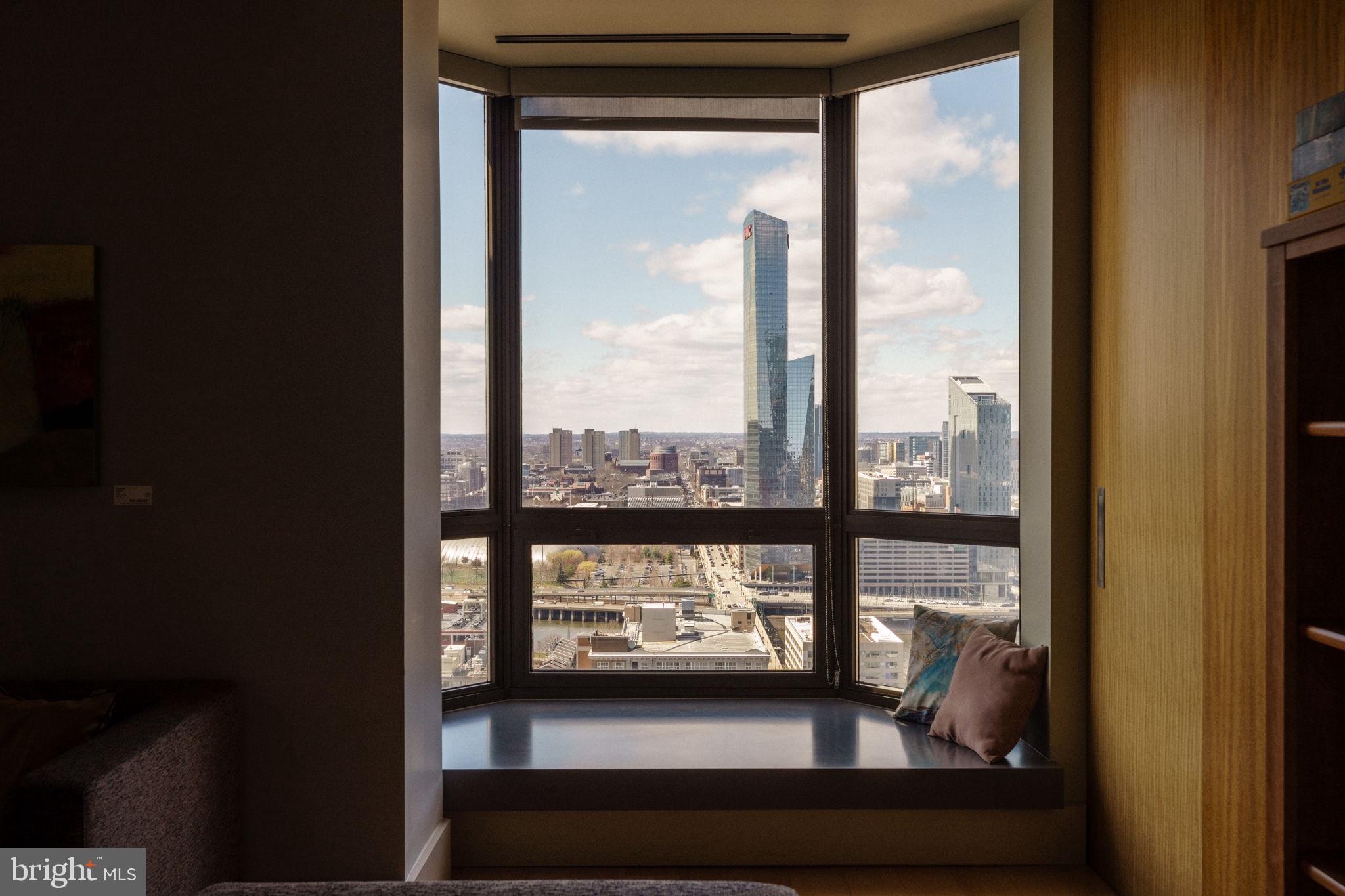 2018-32 Walnut Street, Unit 16GH Philadelphia, PA 19103 - Photo 62 of 78 a view of a glass door and a balcony